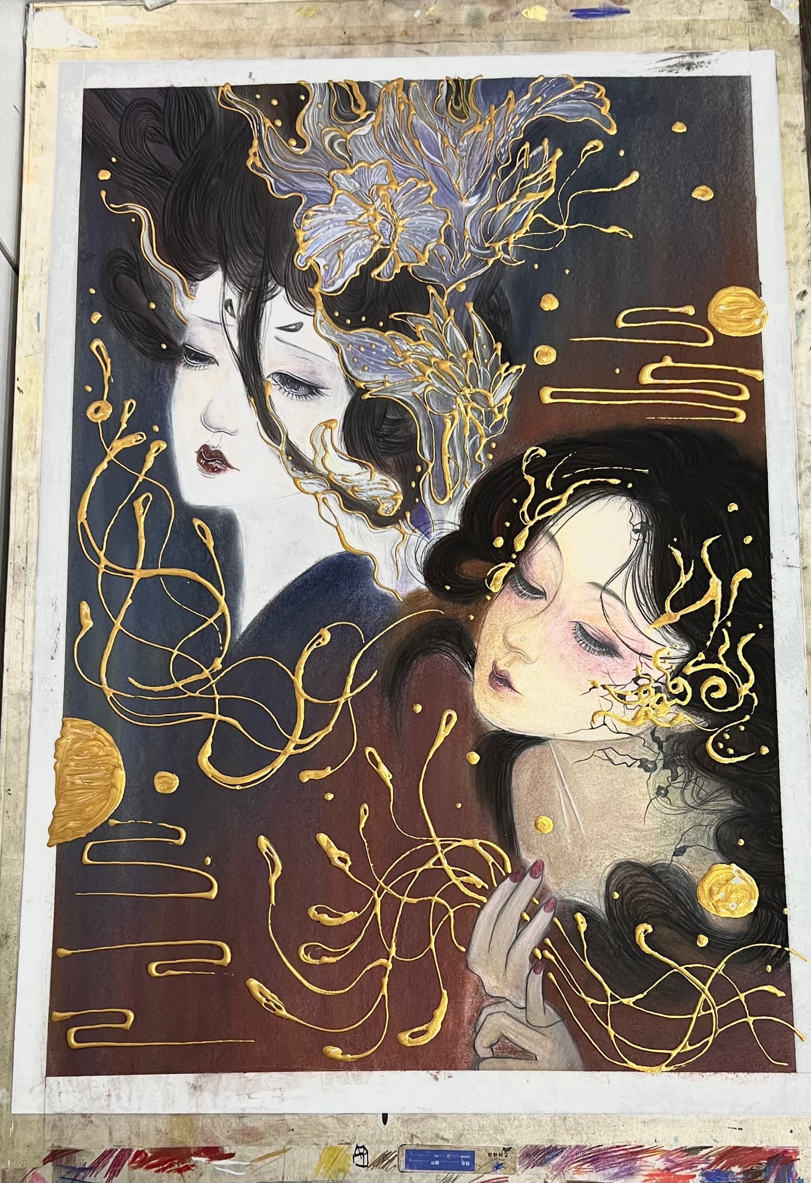 Depict two intertwined figures with golden threads, but using color contrast to emphasize the differences